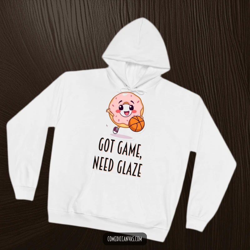 Funny hoodie featuring a smiling donut character joyfully dribbling a basketball, ready to hit the court with sugary enthusiasm.