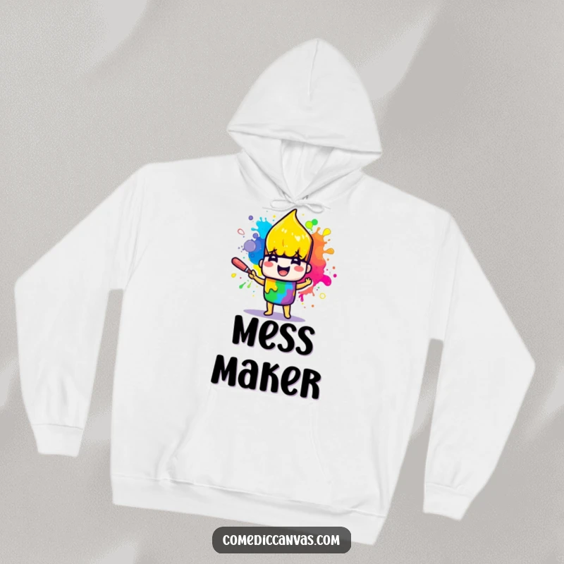 Funny hoodie with a cheerful paintbrush character splattering vibrant rainbow paint, offering cozy artistic expression.