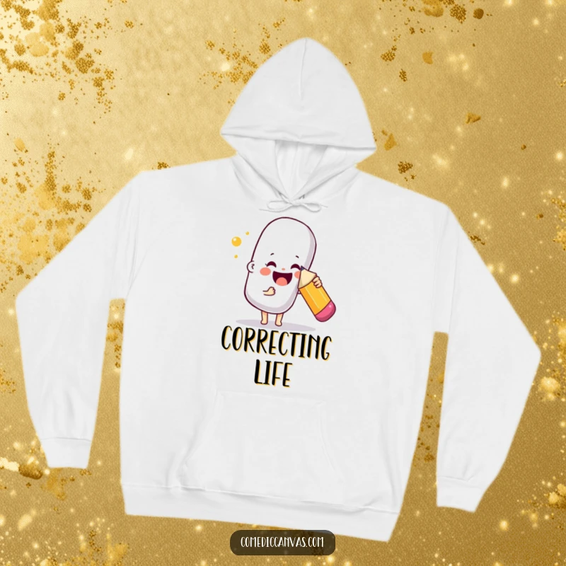 Funny hoodie showing a joyful character poking a giant bouncy eraser with a pencil, perfect for cozy creative sessions.