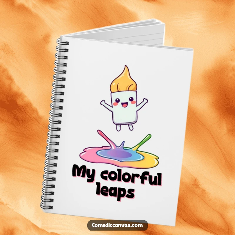 Funny notebook featuring a happy, kawaii paintbrush leaping joyfully between colorful paint puddles, perfect for sketching and writing ideas.