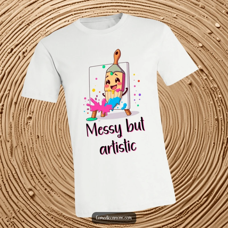 Funny t-shirt with a smiling paintbrush splattering paint, embodying artistic energy and joy, a perfect funny gift.